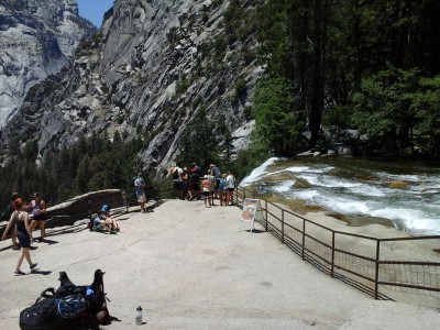 People congregating on the edge of the falls